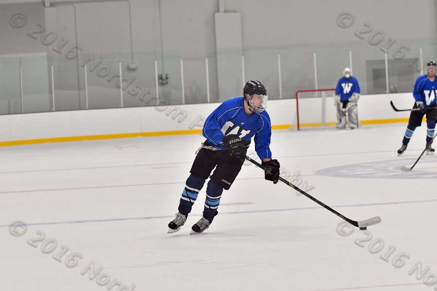 Wheaton College Men\'s Ice Hockey vs Middlesex Community College. - Photo By: KEITH NORDSTROM